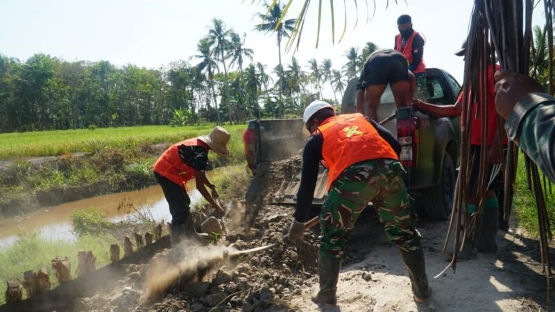 TMMD Ke-129 Genjot Peningkatan Jalan 1,2 Km di Desa Bandaraya, Warga Ikut Gotong Royong